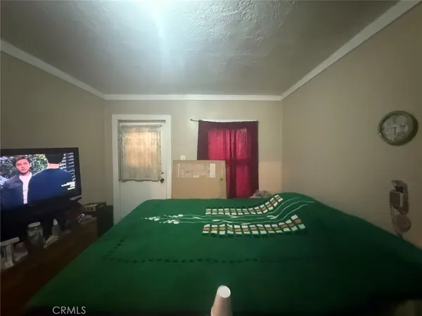 a view of an entrance and a room