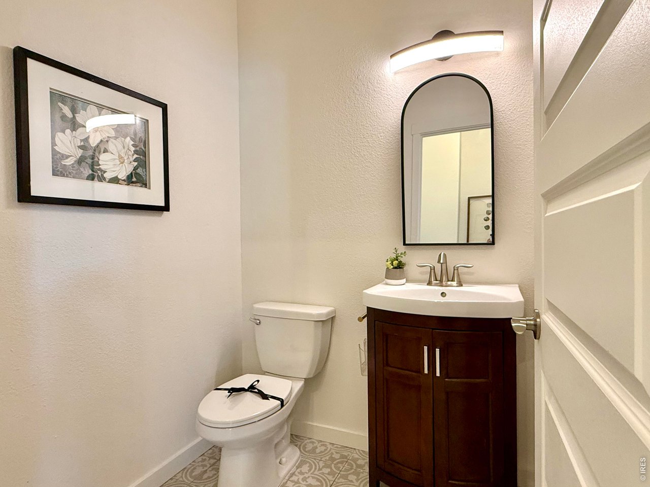 7905 West 11th St Road Greeley, CO 80634 - Photo 19 of 34 Main level powder room