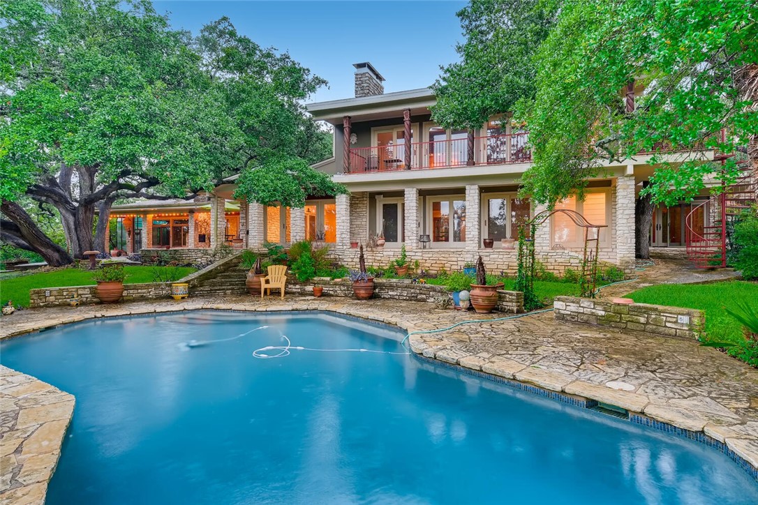 This stately Westlake home sits atop one of the highest points in Travis County. The southern breezes keep you cool when you're not in the pool!