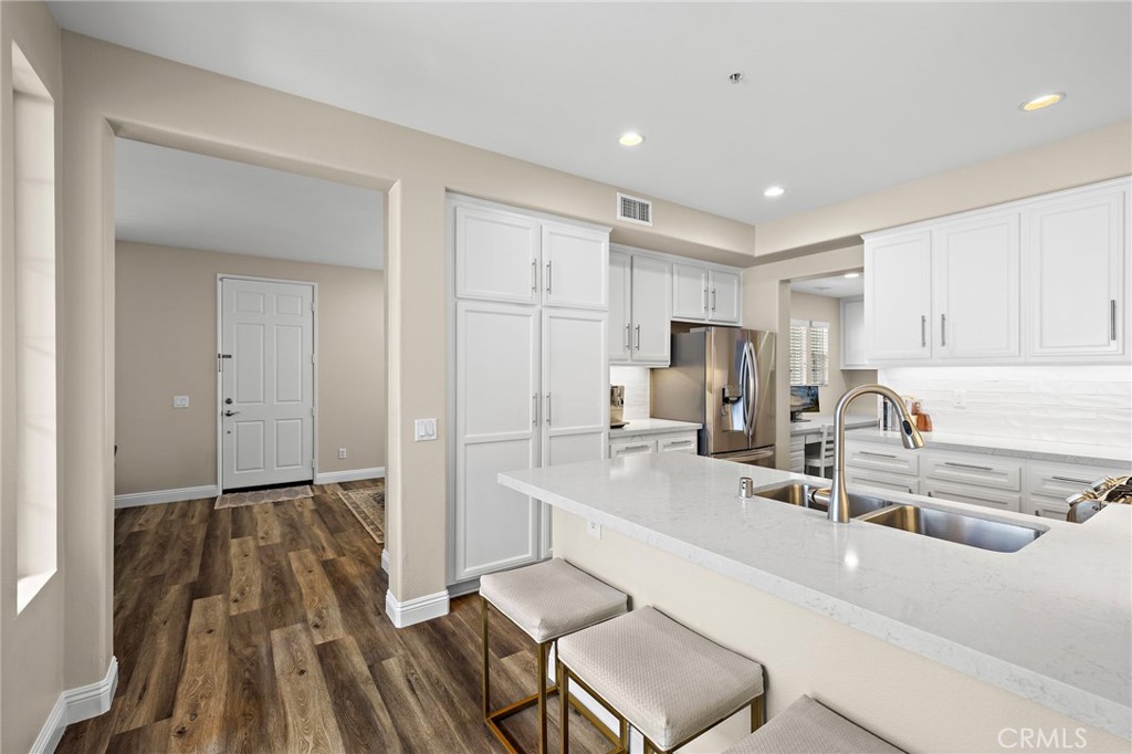 71 Sklar Street Ladera Ranch, CA 92694 - Photo 11 of 55 Remolded Kitchen peninsula bar seating