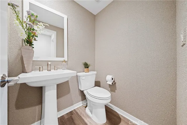 a bathroom with a sink and a toilet
