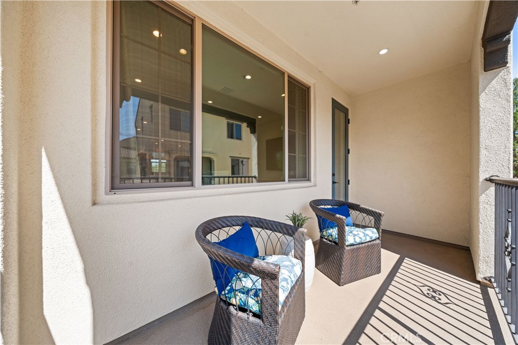 104 Coastal Garden Irvine, CA 92618 - Photo 18 of 43 a view of a dining room with furniture and a window