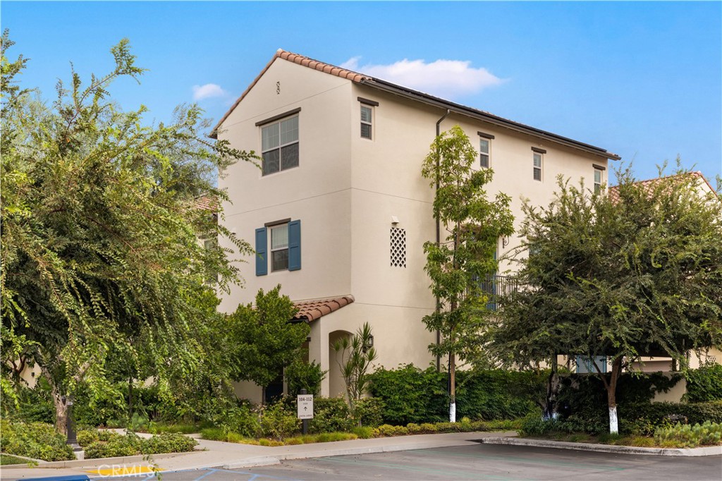 104 Coastal Garden Irvine, CA 92618 - Photo 2 of 43 a view of a house with a yard