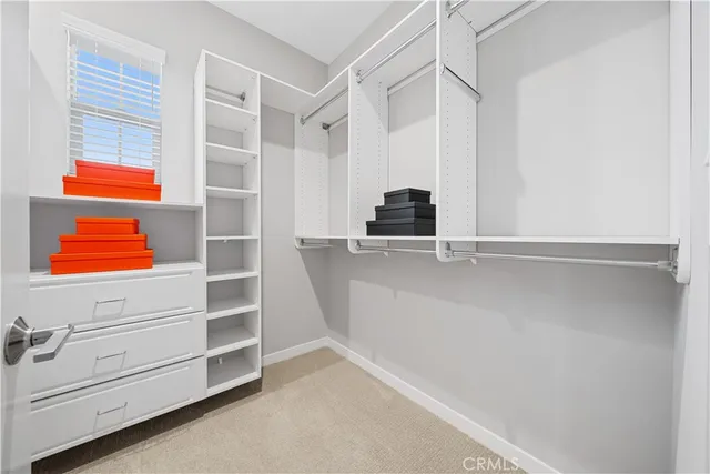 a view of a walk in closet