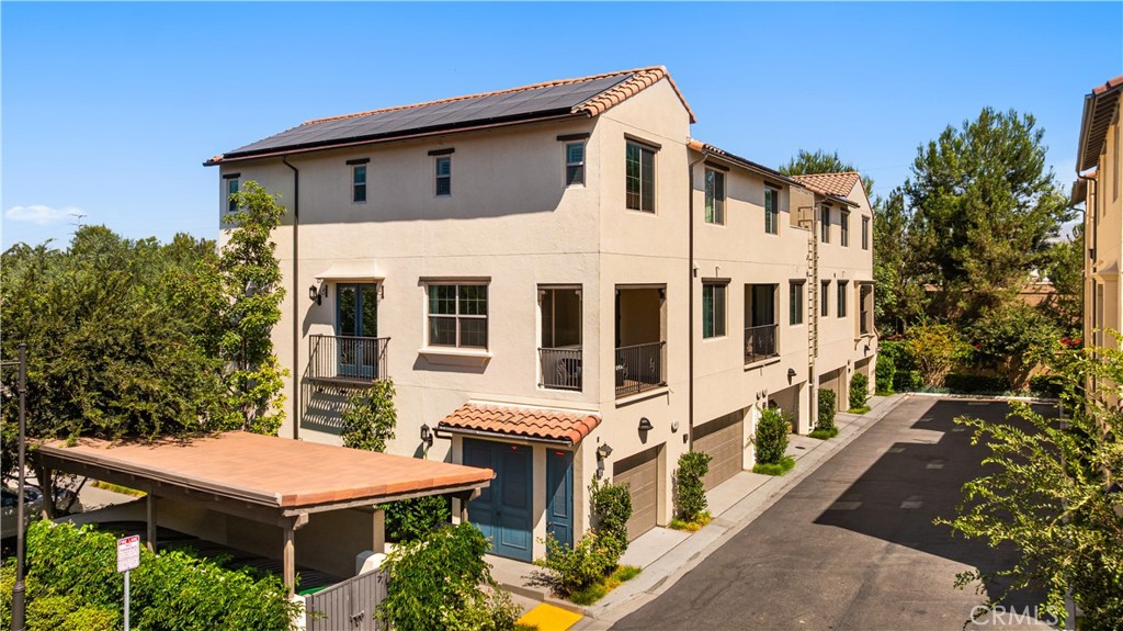 104 Coastal Garden Irvine, CA 92618 - Photo 32 of 43 a view of a house with a yard