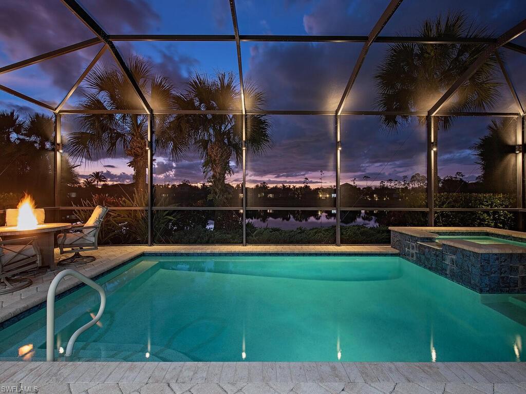 4637 Abaca Circle Naples, FL 34119 - Photo 2 of 29 a view of a chairs and table in a patio