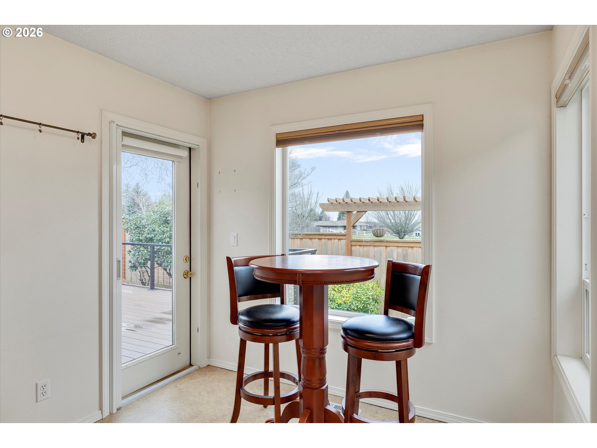 3519 Southwest 28th Terrace Gresham, OR 97080 - Photo 16 of 31 a view of a dining room with furniture and a window
