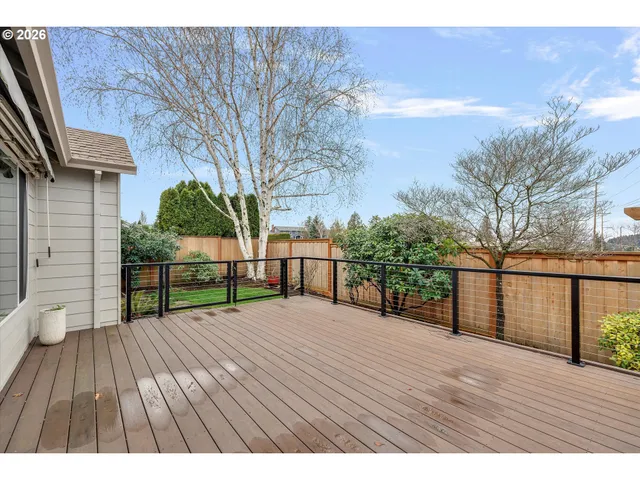 a view of backyard with wooden floor