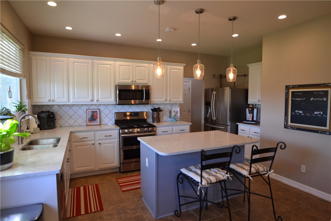 2204 Hayfield Square Pflugerville, TX 78660 - Photo 1 of 1 What an awesome kitchen! New counters and backsplash, stainless steel appliances, recessed lighting,