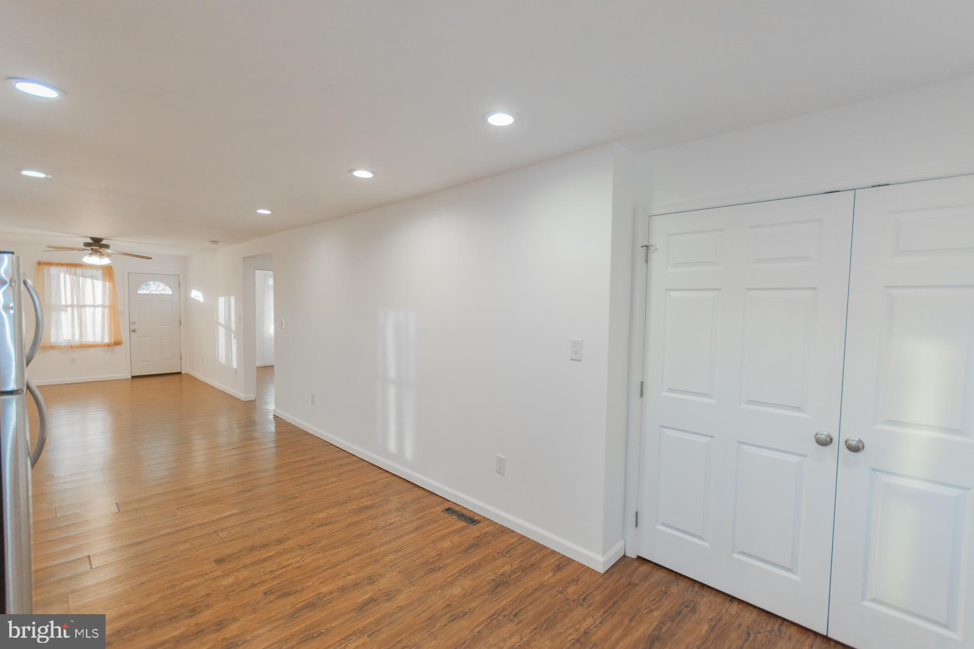 300 West 4th Avenue Ranson, WV 25438 - Photo 13 of 45 a view of an empty room with wooden floor