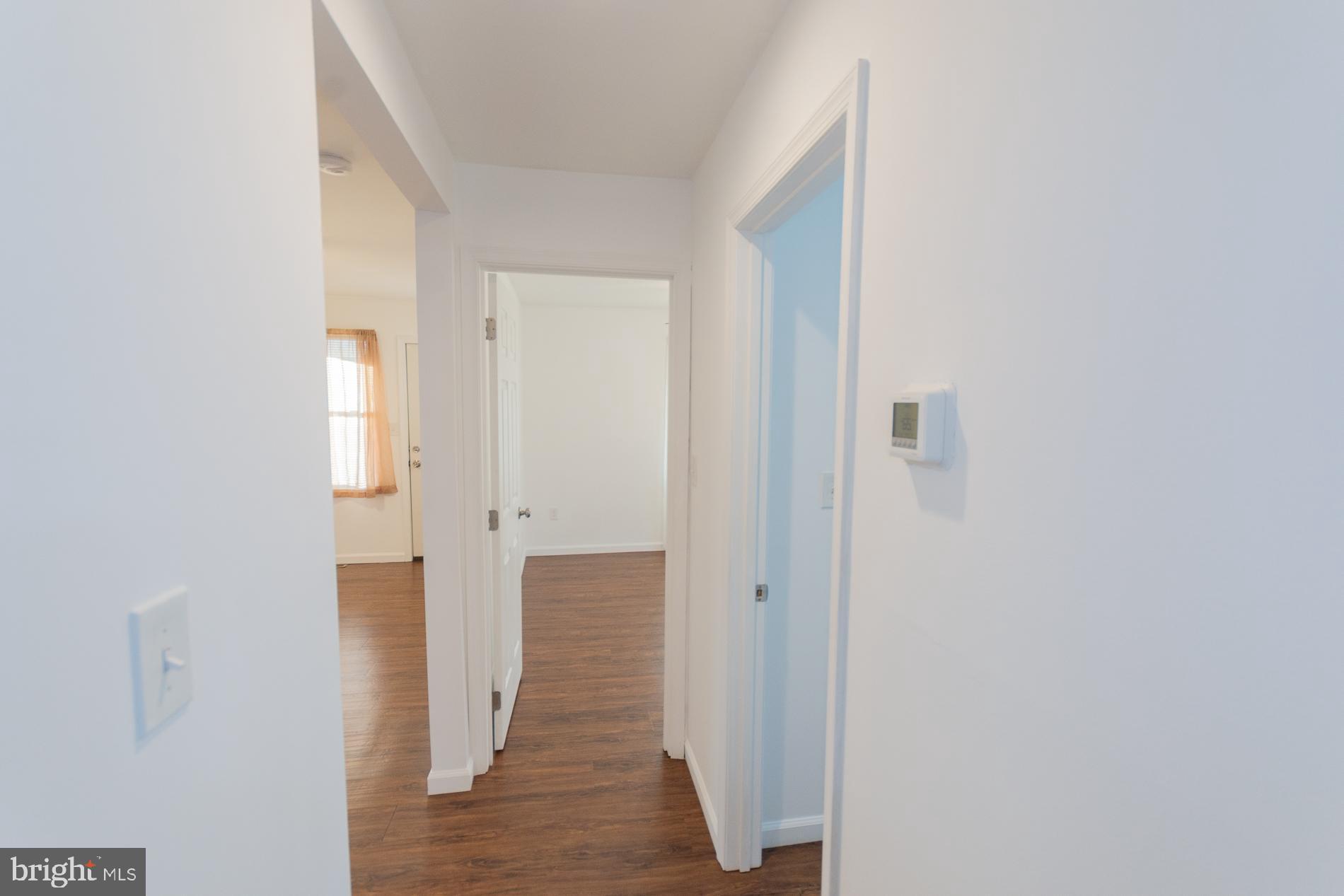 300 West 4th Avenue Ranson, WV 25438 - Photo 15 of 45 a view of a bathroom with mirror