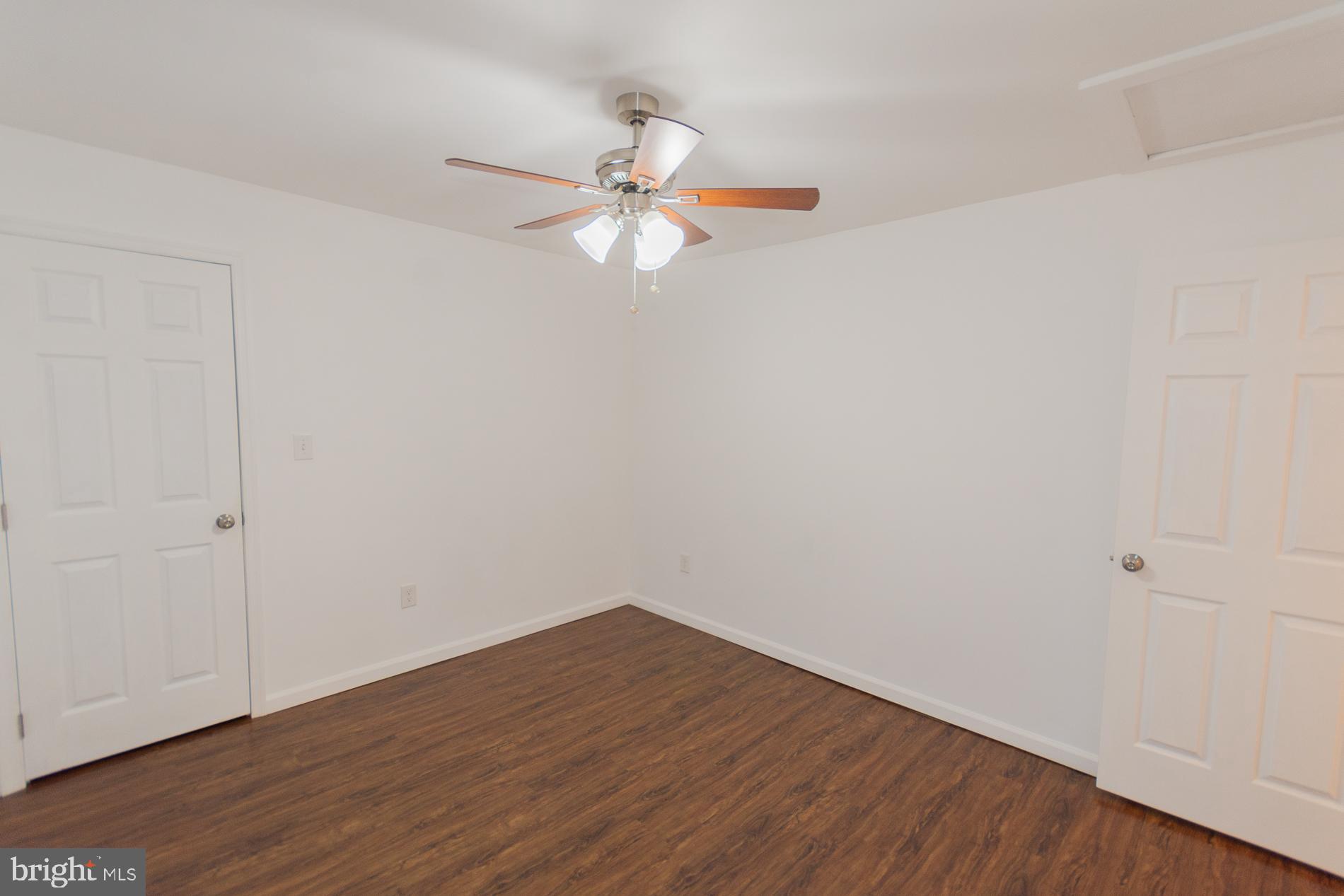 300 West 4th Avenue Ranson, WV 25438 - Photo 23 of 45 a view of an empty room with wooden floor