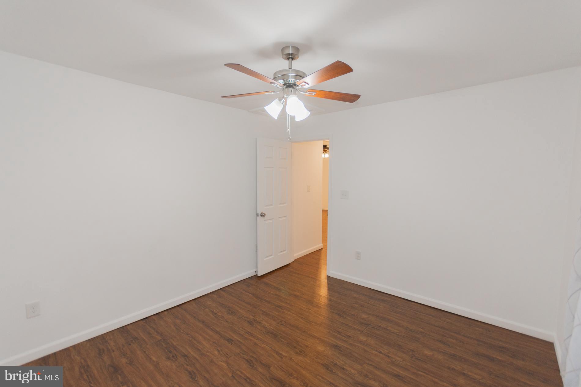 300 West 4th Avenue Ranson, WV 25438 - Photo 24 of 45 a view of a room with wooden floor