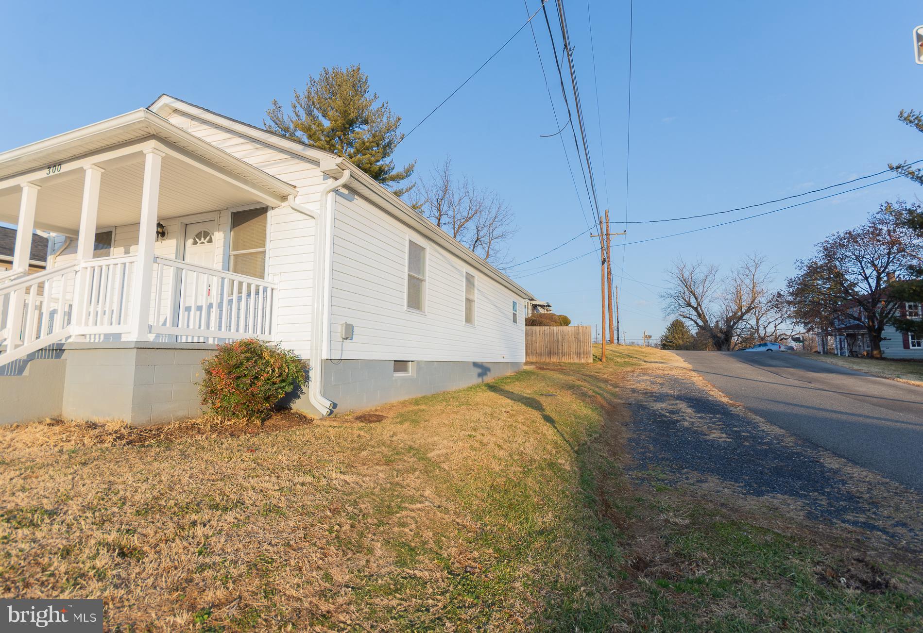 300 West 4th Avenue Ranson, WV 25438 - Photo 45 of 45 a front view of a house with a yard