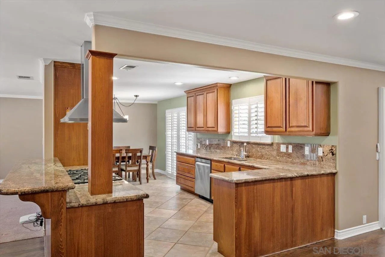 830 Steffy Road Ramona, CA 92065 - Photo 16 of 45 a kitchen with stainless steel appliances granite countertop sink stove and cabinets