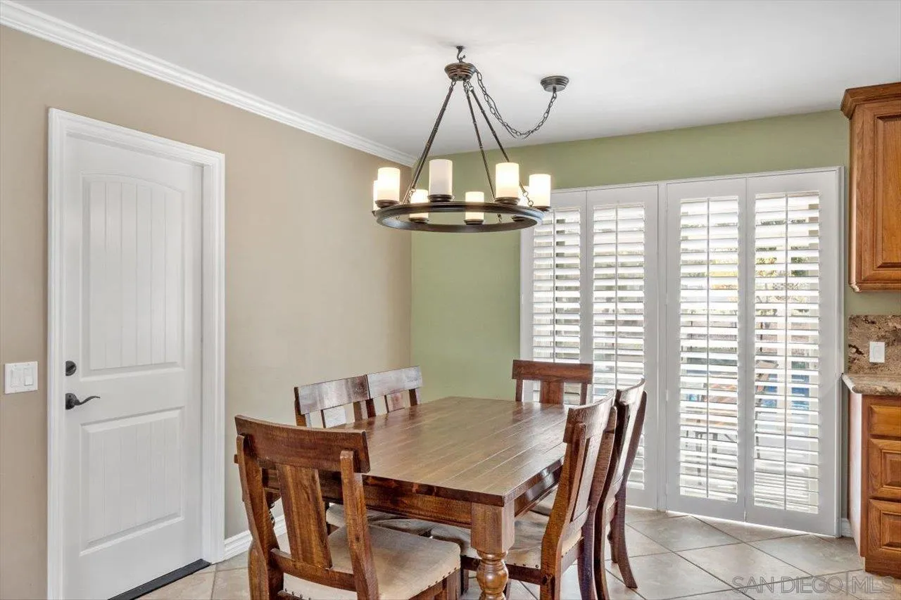 830 Steffy Road Ramona, CA 92065 - Photo 20 of 45 a view of a dining room with furniture window and outside view