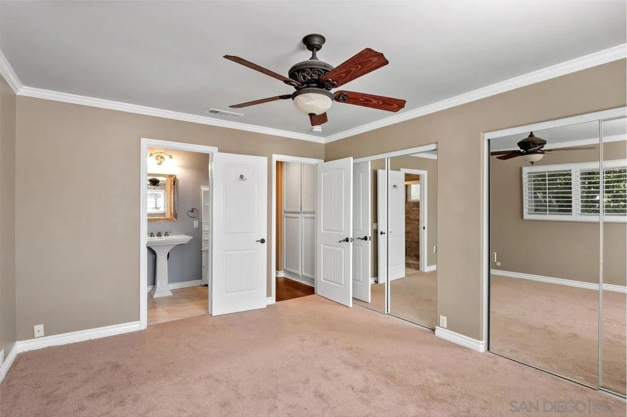 830 Steffy Road Ramona, CA 92065 - Photo 24 of 45 a view of a livingroom with a ceiling fan & windows
