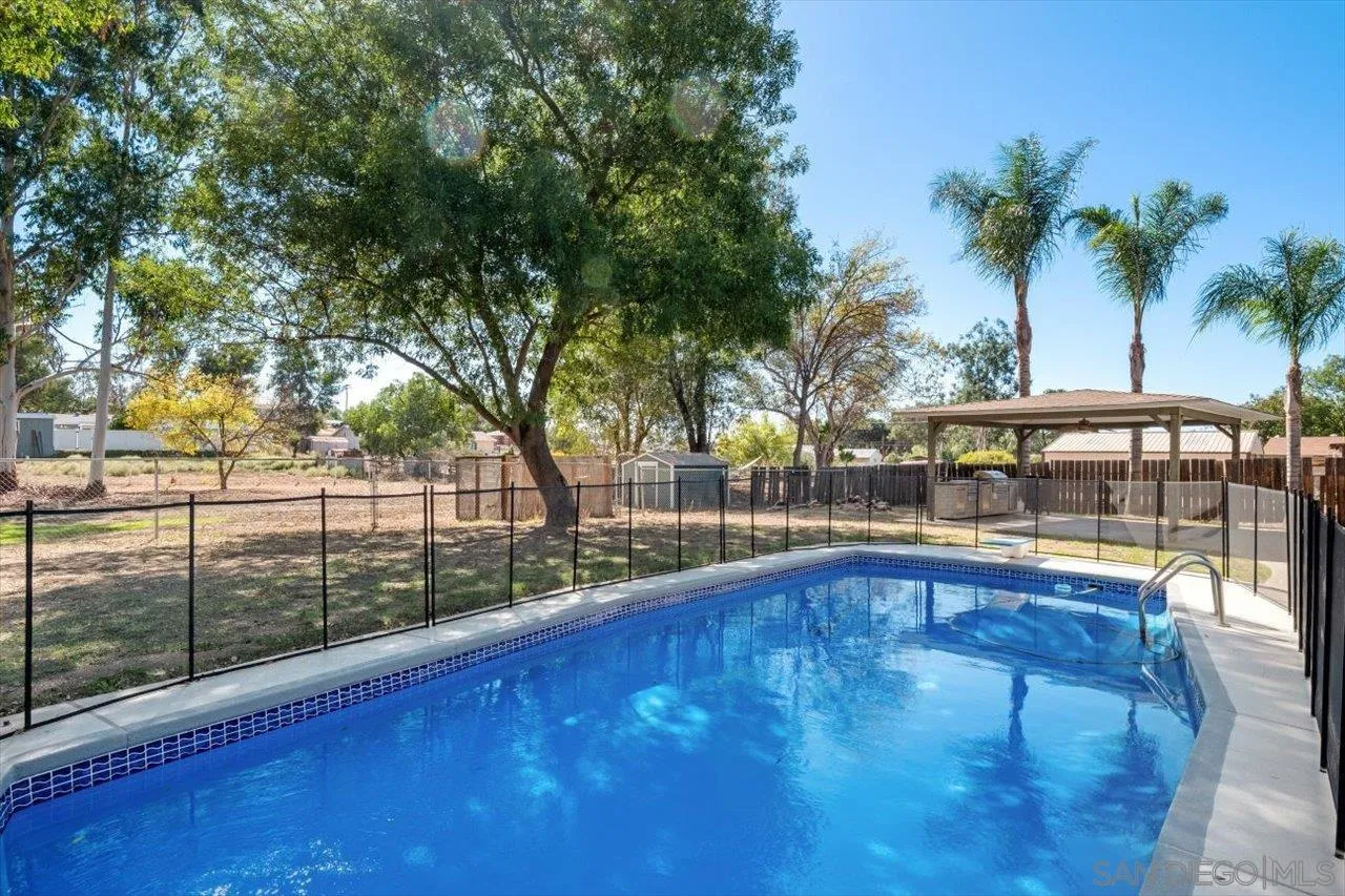 830 Steffy Road Ramona, CA 92065 - Photo 31 of 45 a swimming pool with outdoor seating and yard