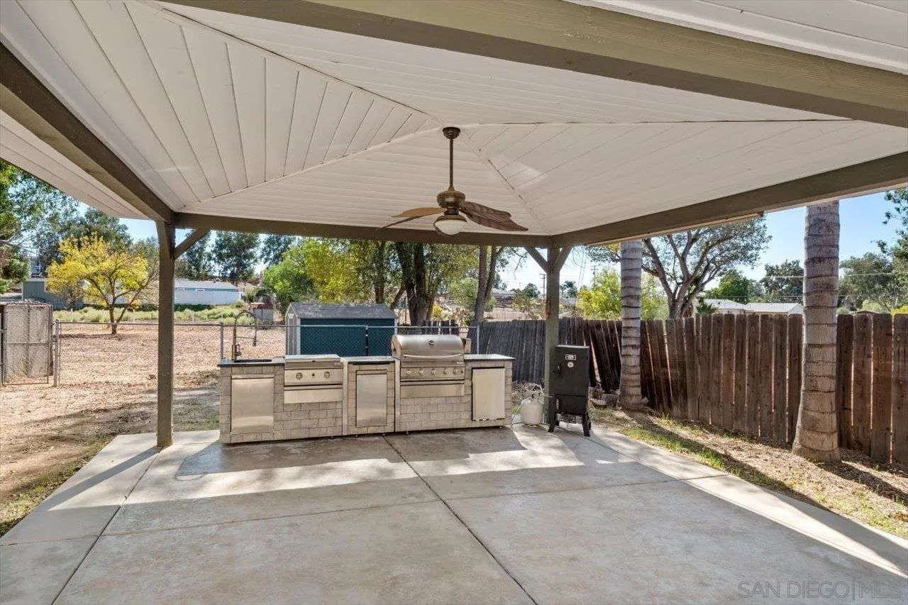 830 Steffy Road Ramona, CA 92065 - Photo 34 of 45 a view of a patio with a table and chairs