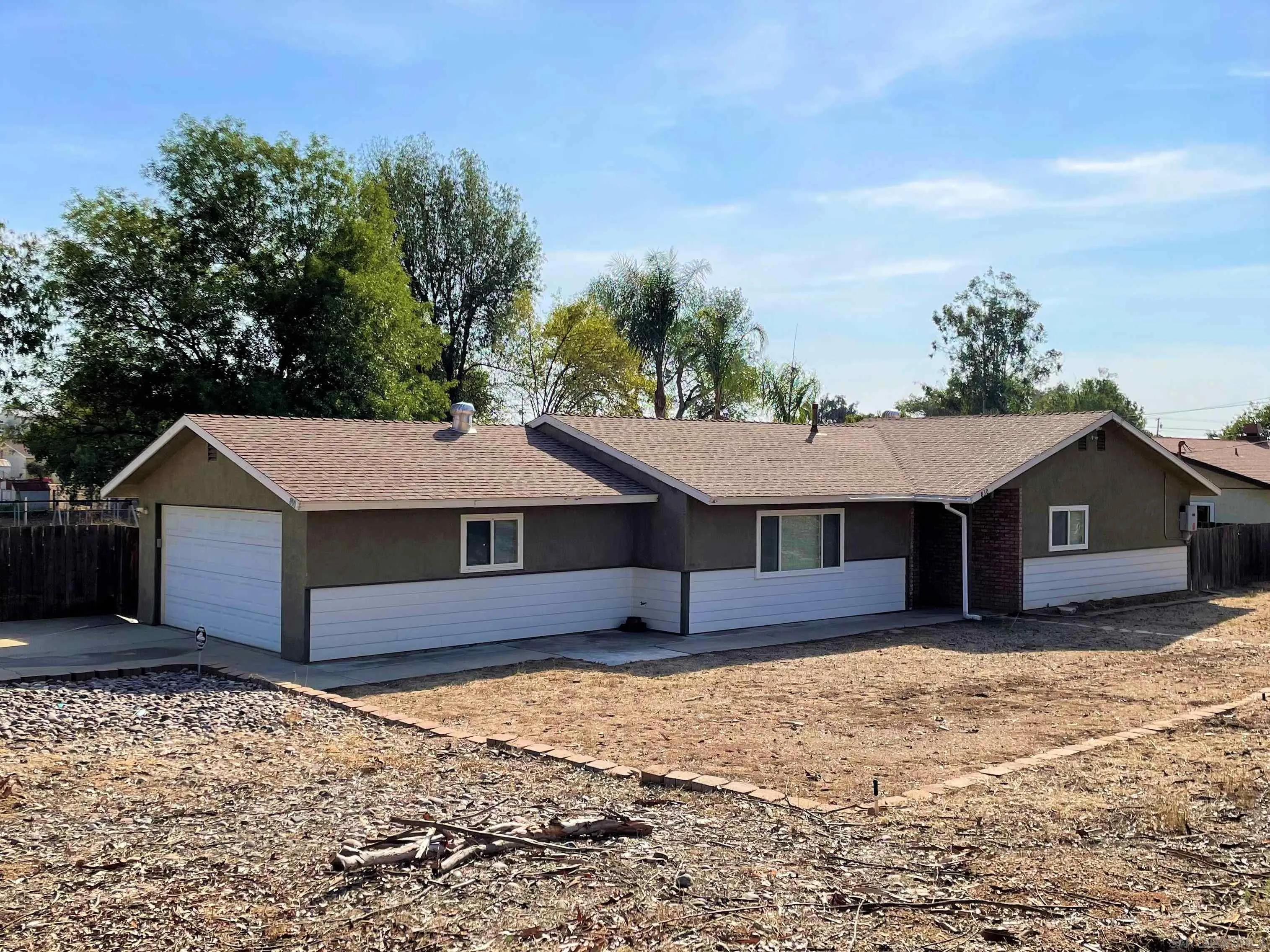 830 Steffy Road Ramona, CA 92065 - Photo 35 of 45 a house that has a tree in front of it