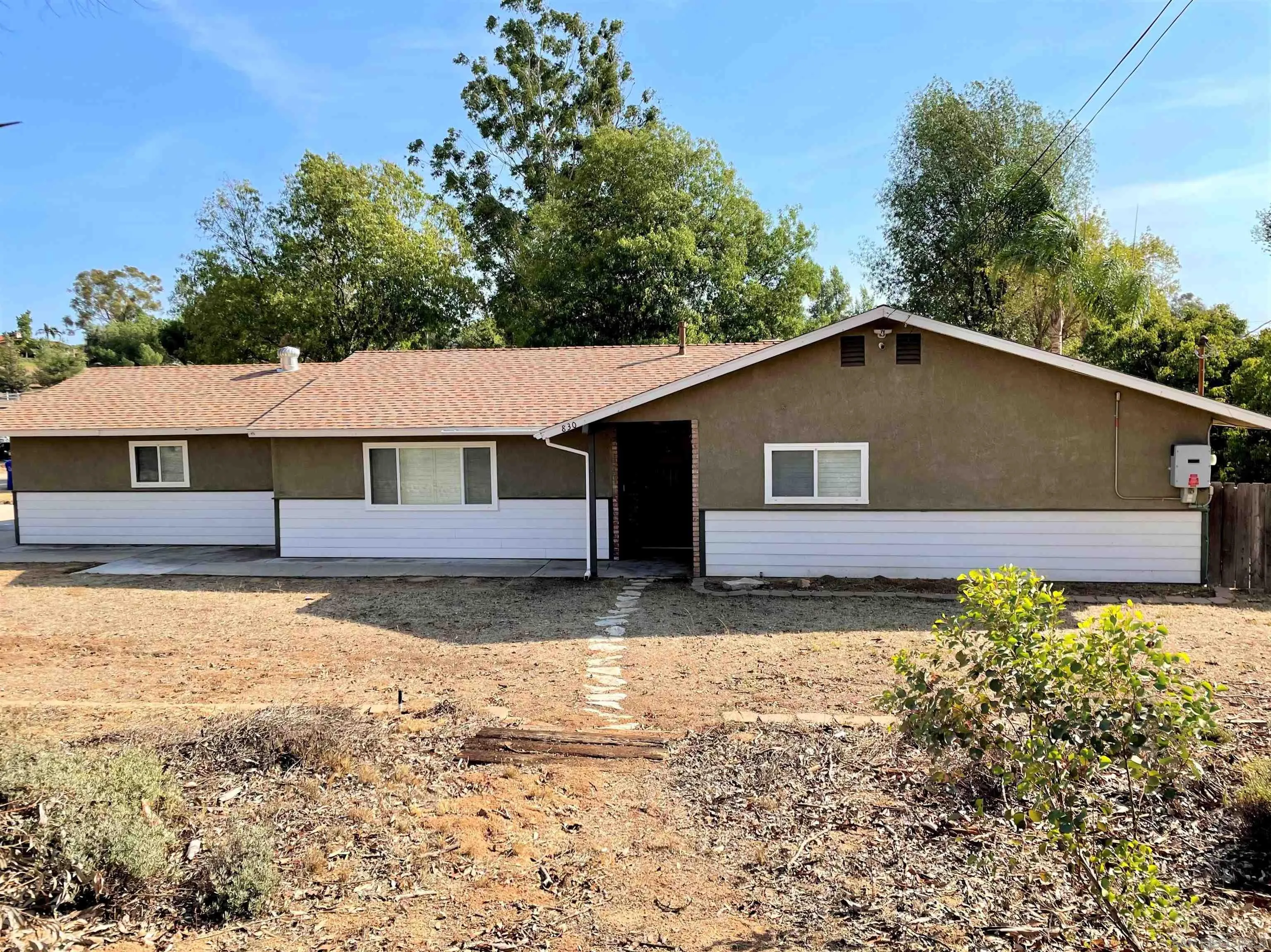 830 Steffy Road Ramona, CA 92065 - Photo 38 of 45 a house with trees in the background