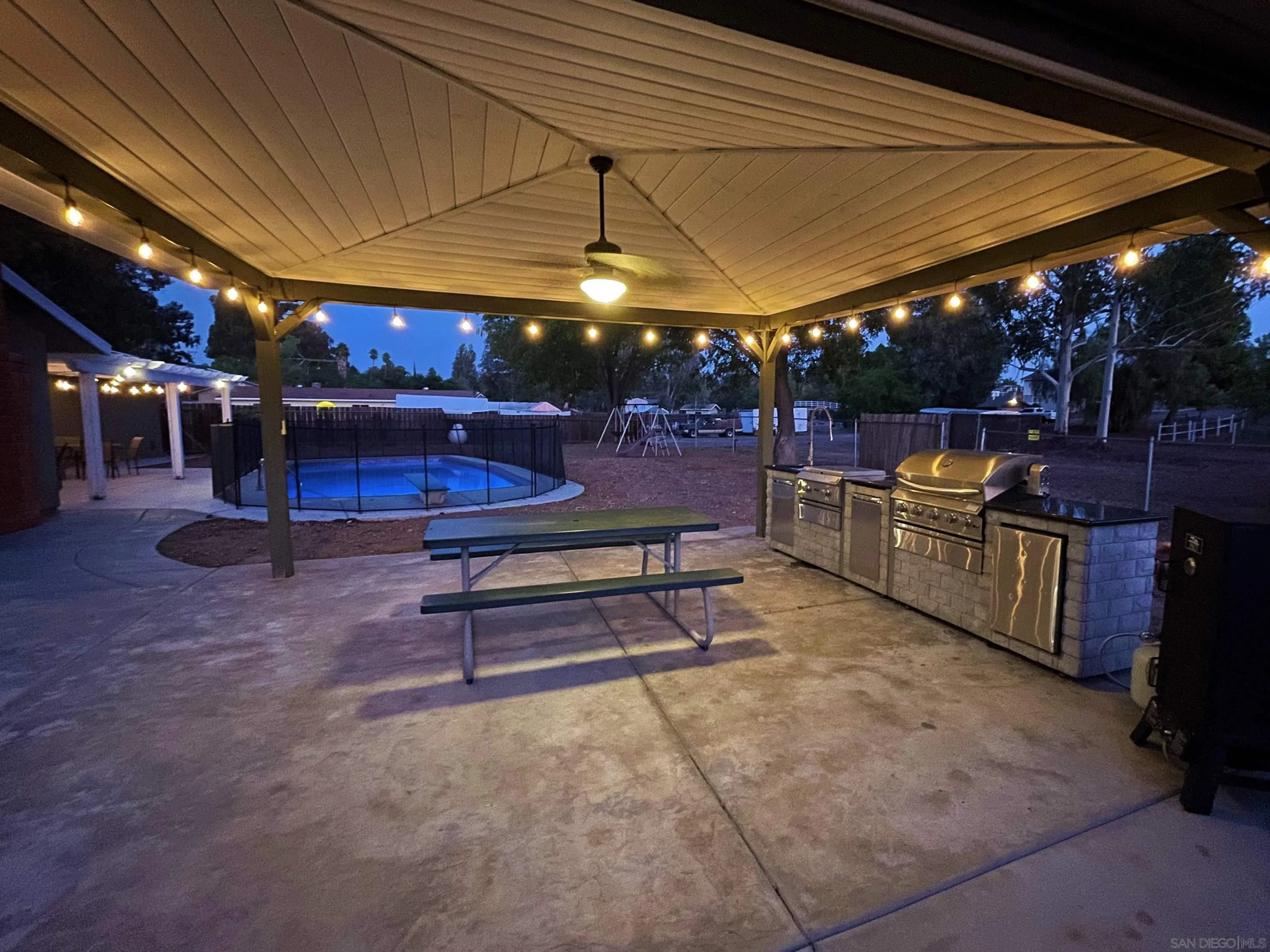 830 Steffy Road Ramona, CA 92065 - Photo 5 of 45 a view of a chairs and tables in the patio