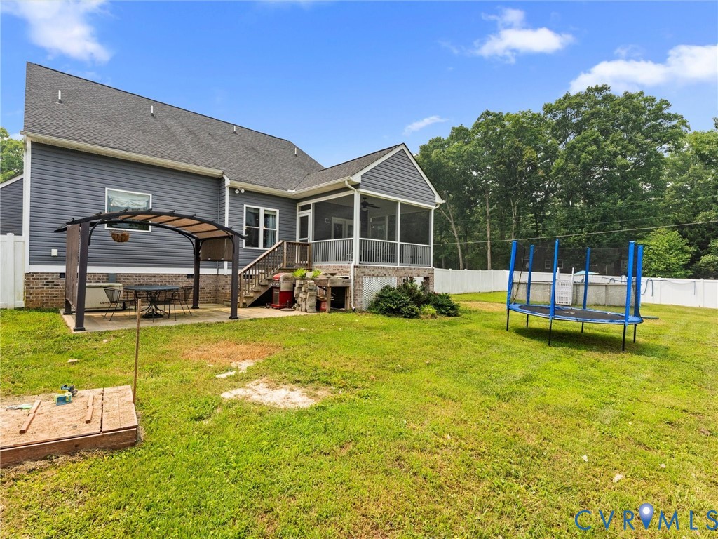 11390 Rocky Ridge Road Glen Allen, VA 23059 - Photo 23 of 82 Expansive backyard featuring a screened porch, cov