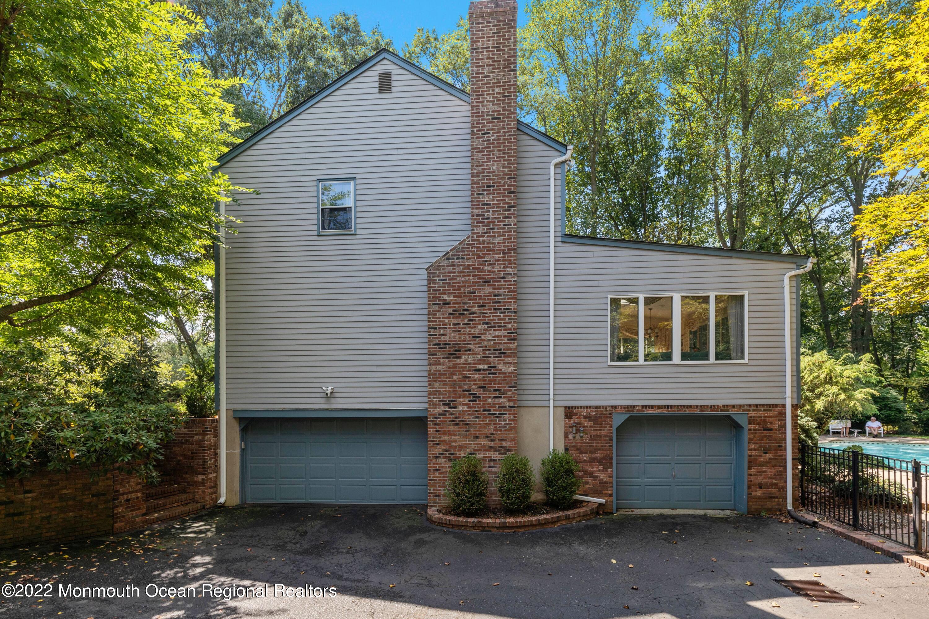161 Hillyer Circle Middletown, NJ 07748 - Photo 11 of 64 a view of a house with a yard
