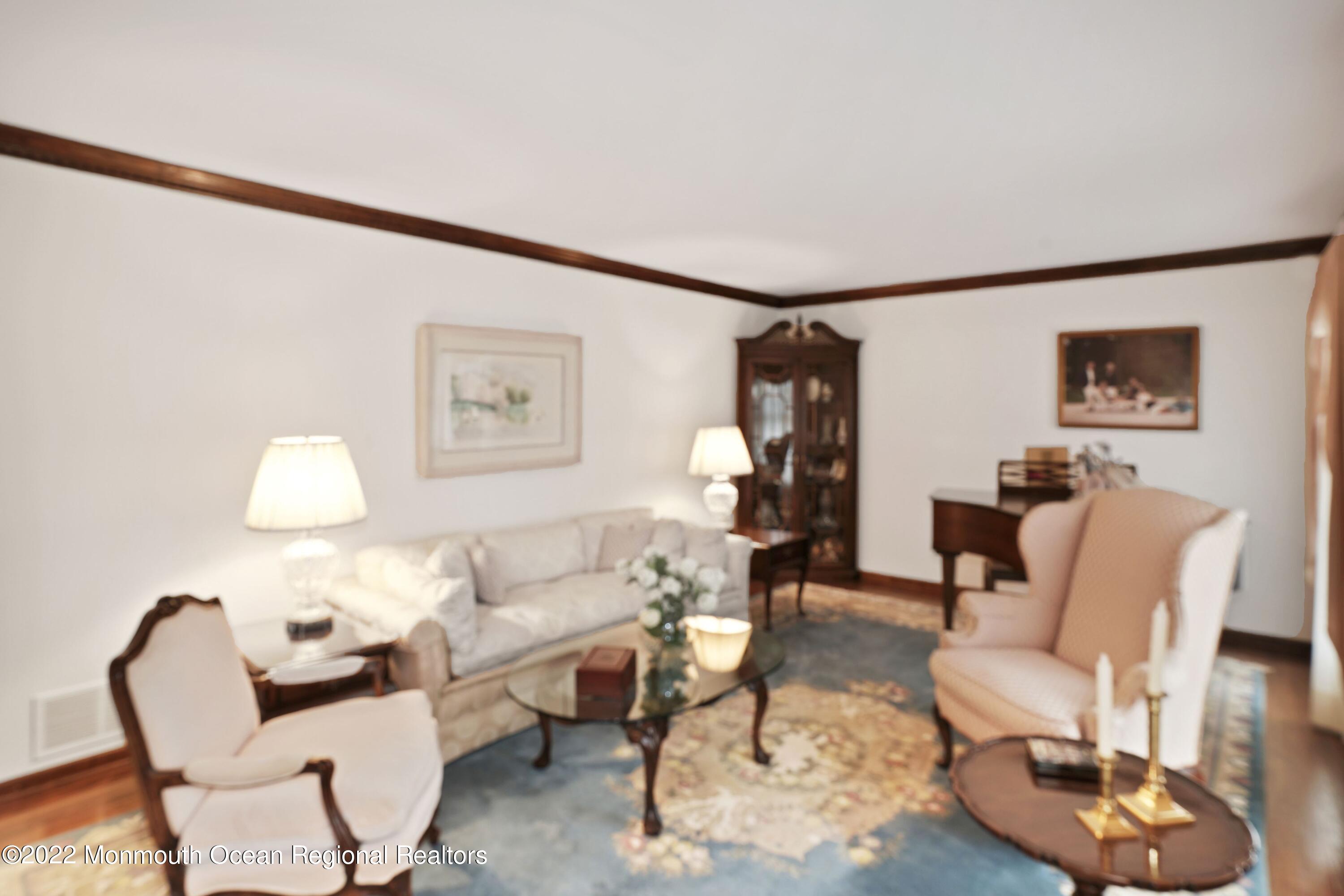 161 Hillyer Circle Middletown, NJ 07748 - Photo 14 of 64 a living room with furniture and a wooden floor