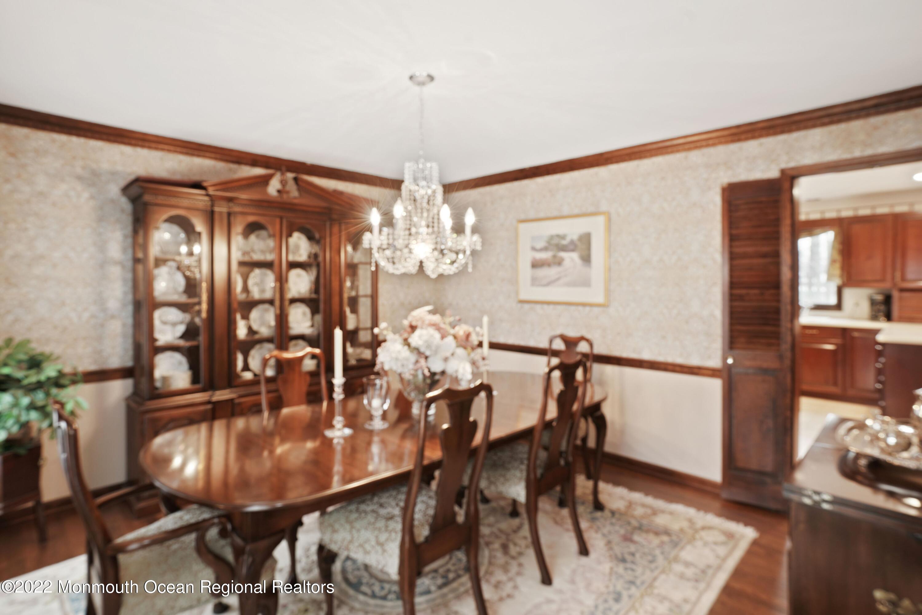 161 Hillyer Circle Middletown, NJ 07748 - Photo 17 of 64 a view of a dining room with furniture and chandelier