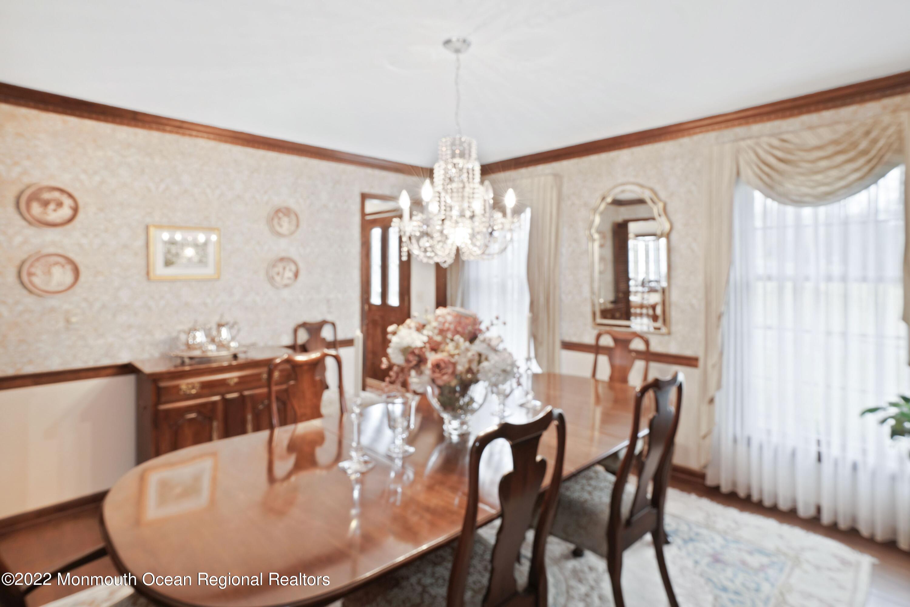 161 Hillyer Circle Middletown, NJ 07748 - Photo 19 of 64 a view of a dining room with furniture and chandelier