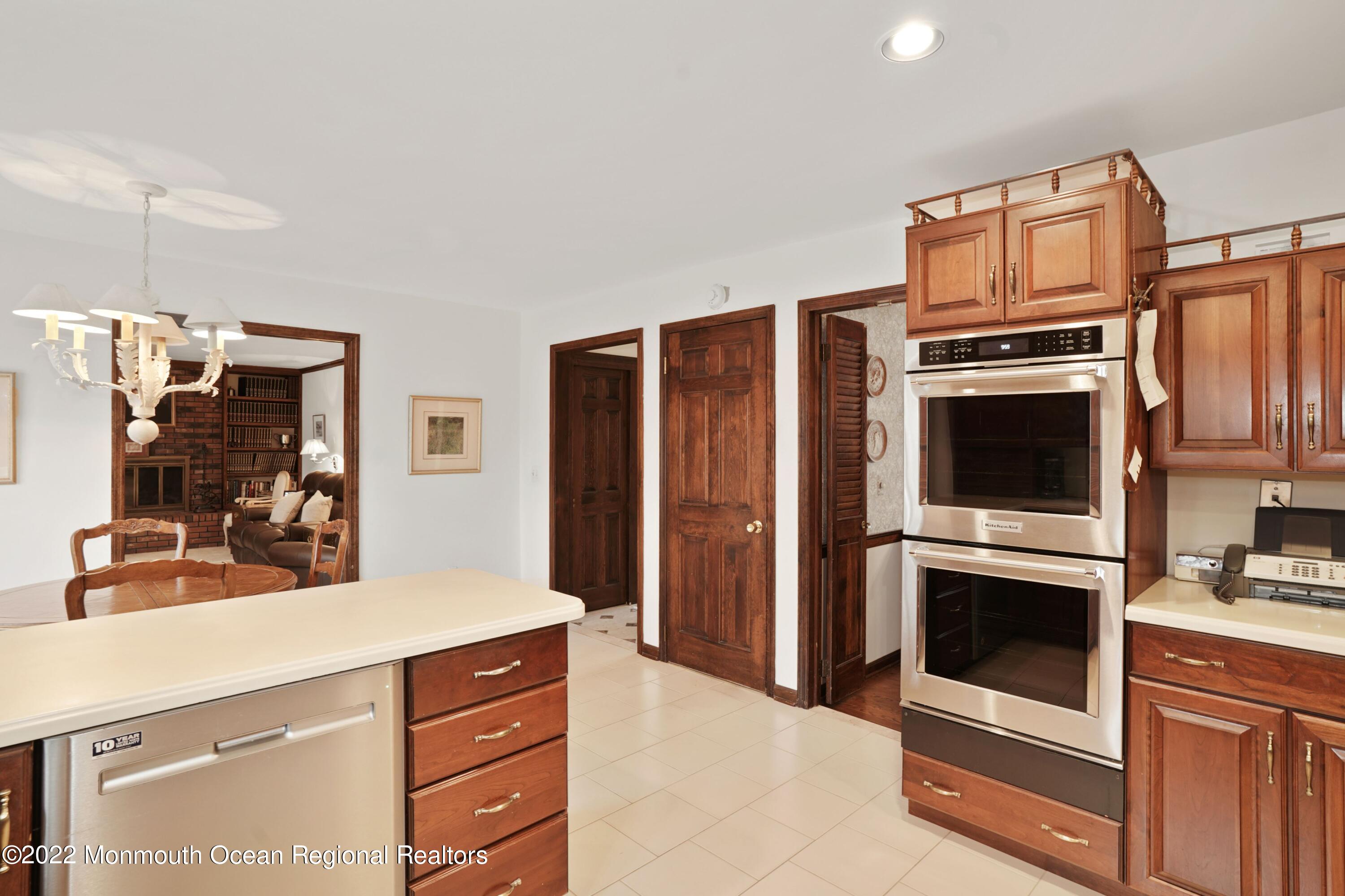 161 Hillyer Circle Middletown, NJ 07748 - Photo 22 of 64 a kitchen with stainless steel appliances granite countertop a stove microwave and refrigerator