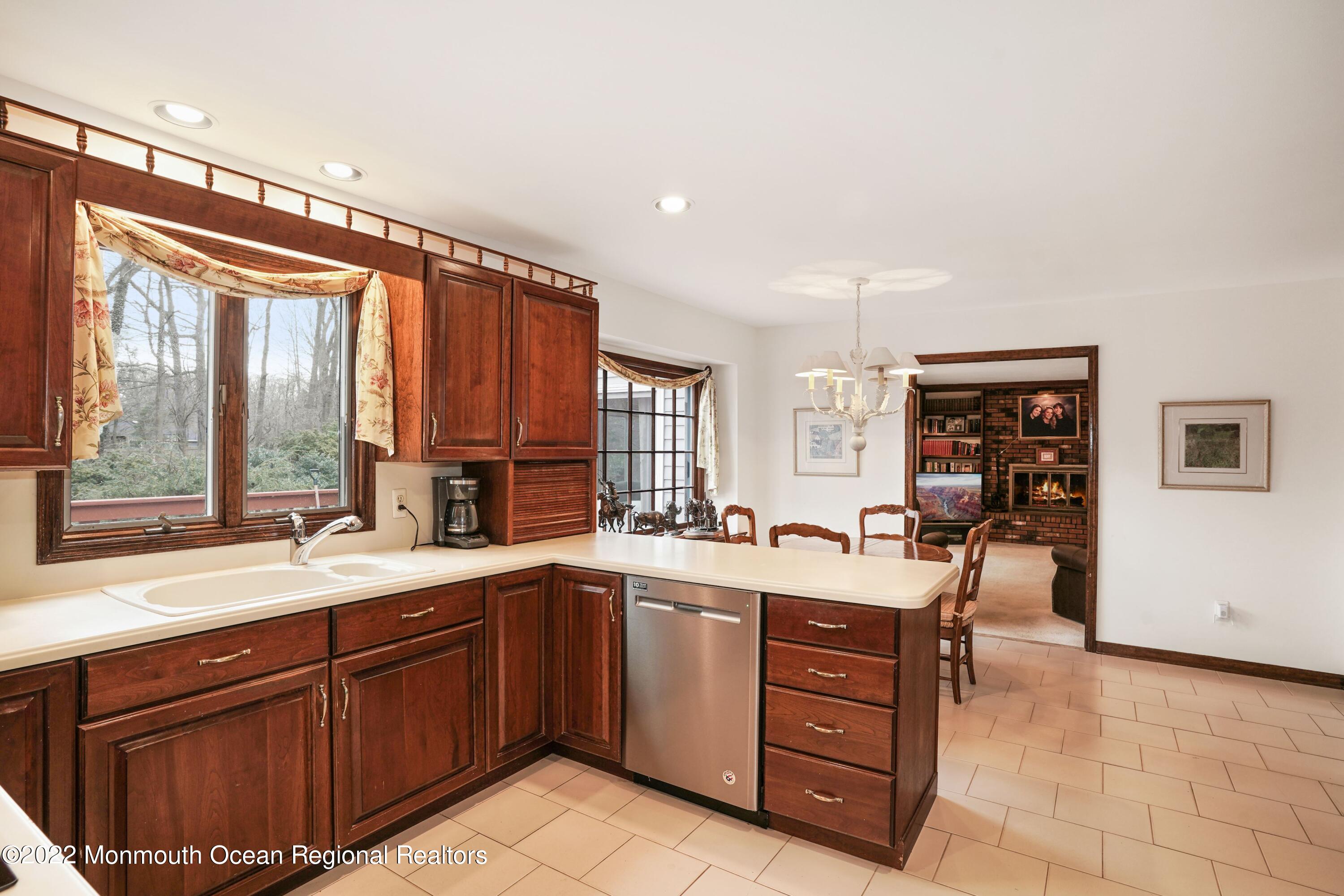 161 Hillyer Circle Middletown, NJ 07748 - Photo 23 of 64 a kitchen with a sink a counter top space and appliances