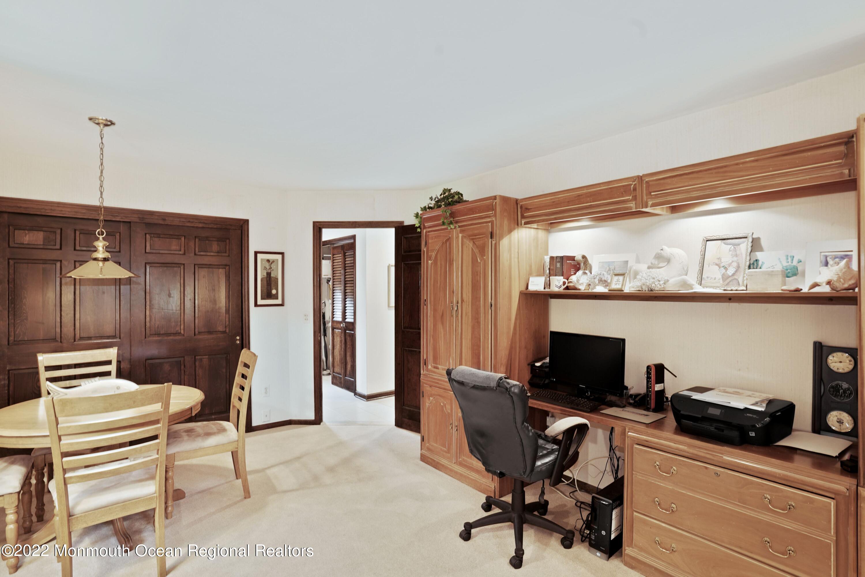 161 Hillyer Circle Middletown, NJ 07748 - Photo 27 of 64 a view of a workspace with furniture and a window