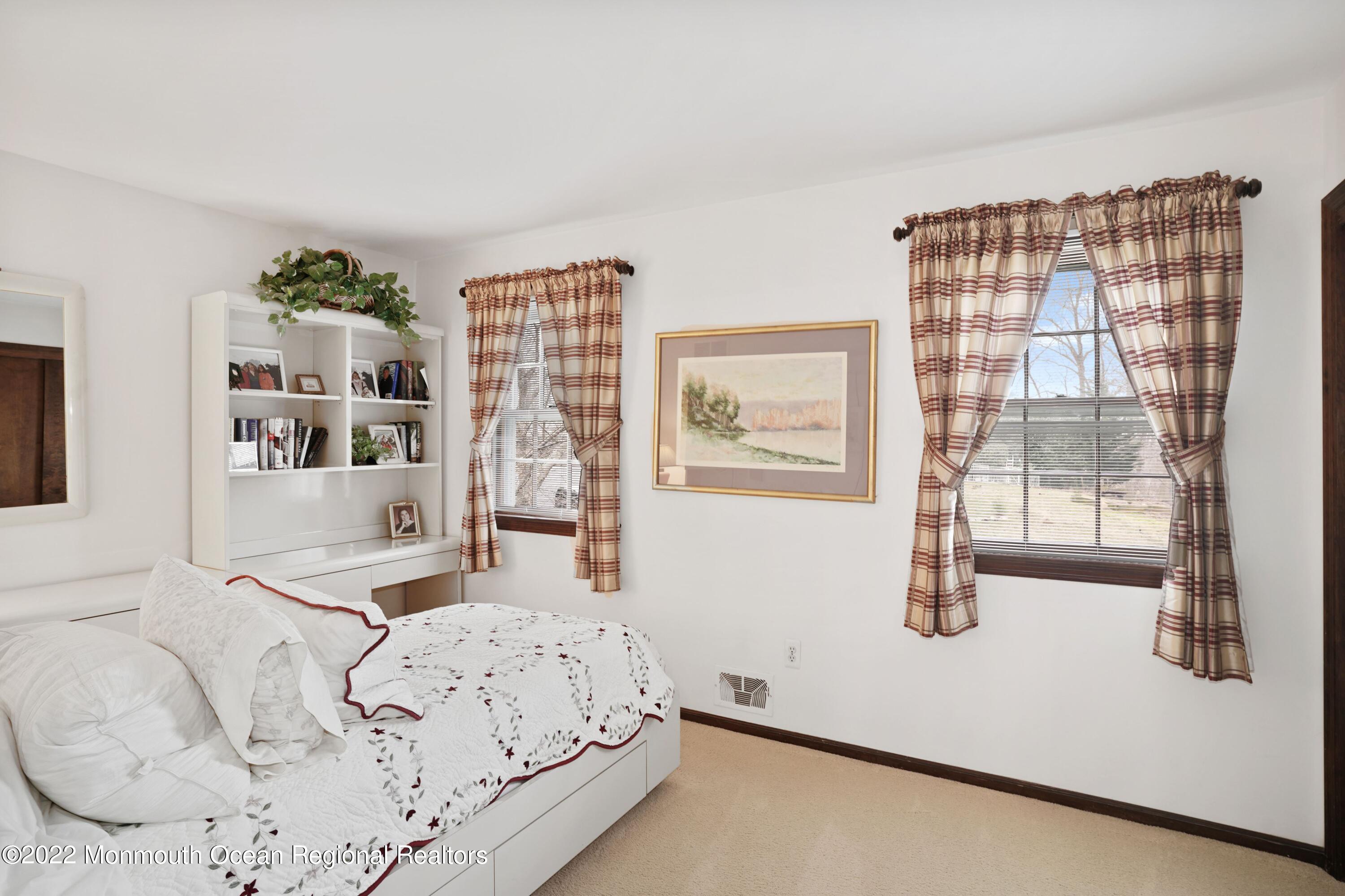 161 Hillyer Circle Middletown, NJ 07748 - Photo 33 of 64 a bedroom with a bed and a window