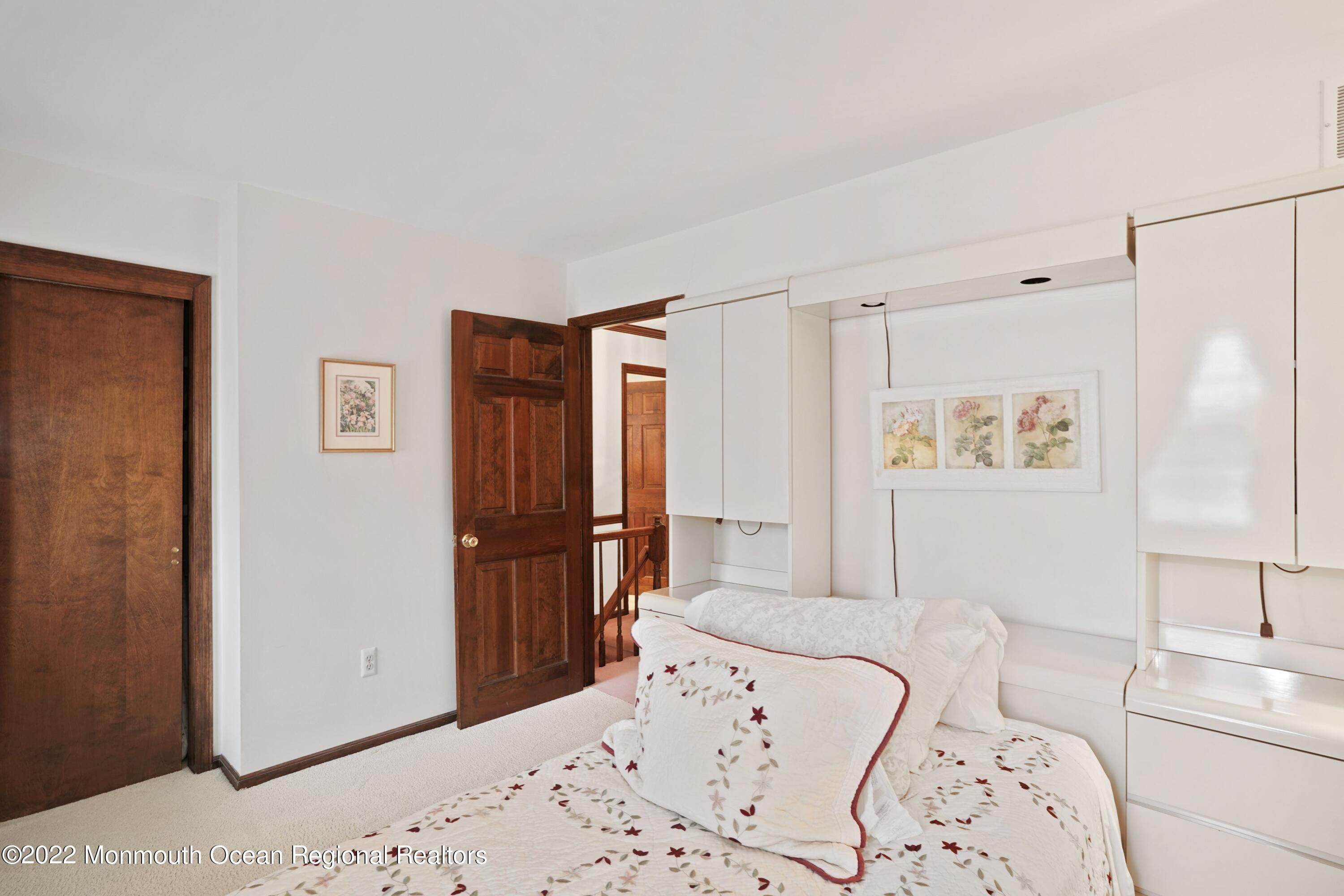 161 Hillyer Circle Middletown, NJ 07748 - Photo 34 of 64 a bedroom with a bed and a window with bathroom