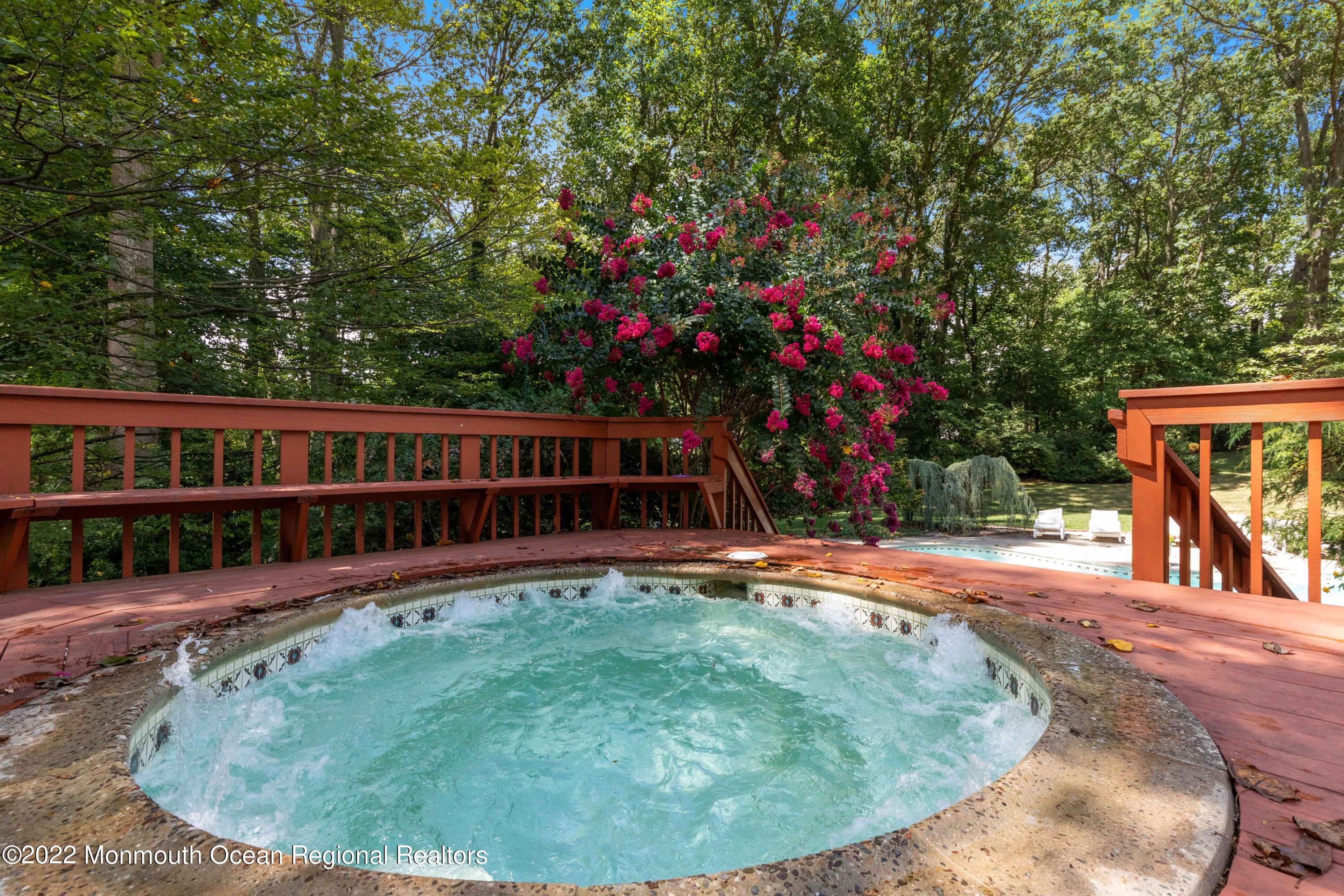 161 Hillyer Circle Middletown, NJ 07748 - Photo 57 of 64 a view of swimming pool with a lounge chairs