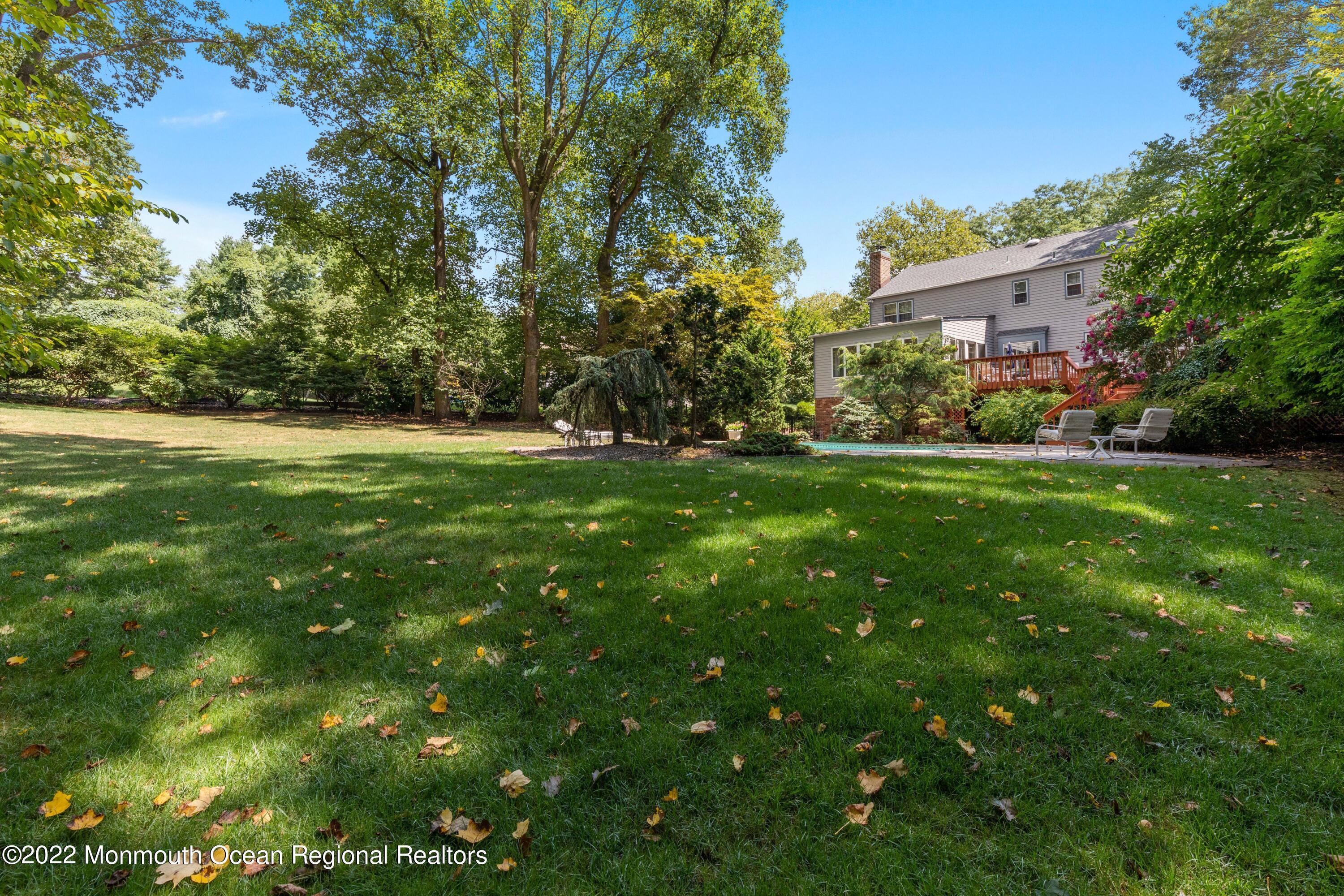 161 Hillyer Circle Middletown, NJ 07748 - Photo 64 of 64 a view of a big yard with plants and large trees