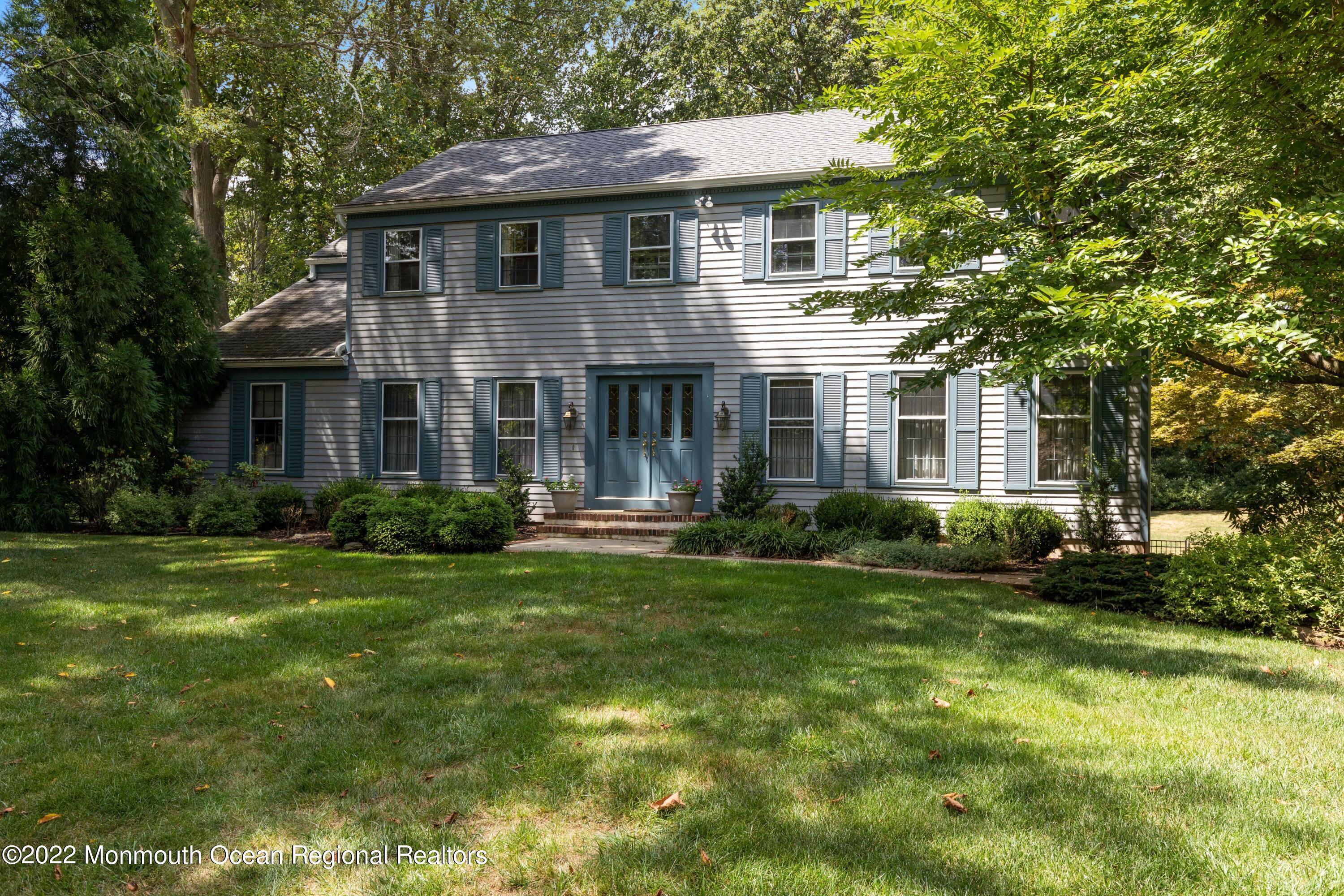 161 Hillyer Circle Middletown, NJ 07748 - Photo 7 of 64 a front view of a house with a yard