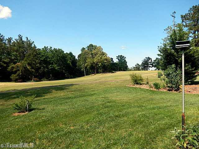 952 Rivers Edge Drive Graham, NC 27253 - Photo 4 of 16 Exterior Back. golf course view