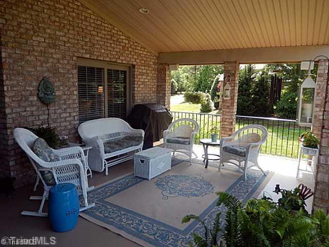 952 Rivers Edge Drive Graham, NC 27253 - Photo 5 of 16 Exterior Back. relax on the patio!!