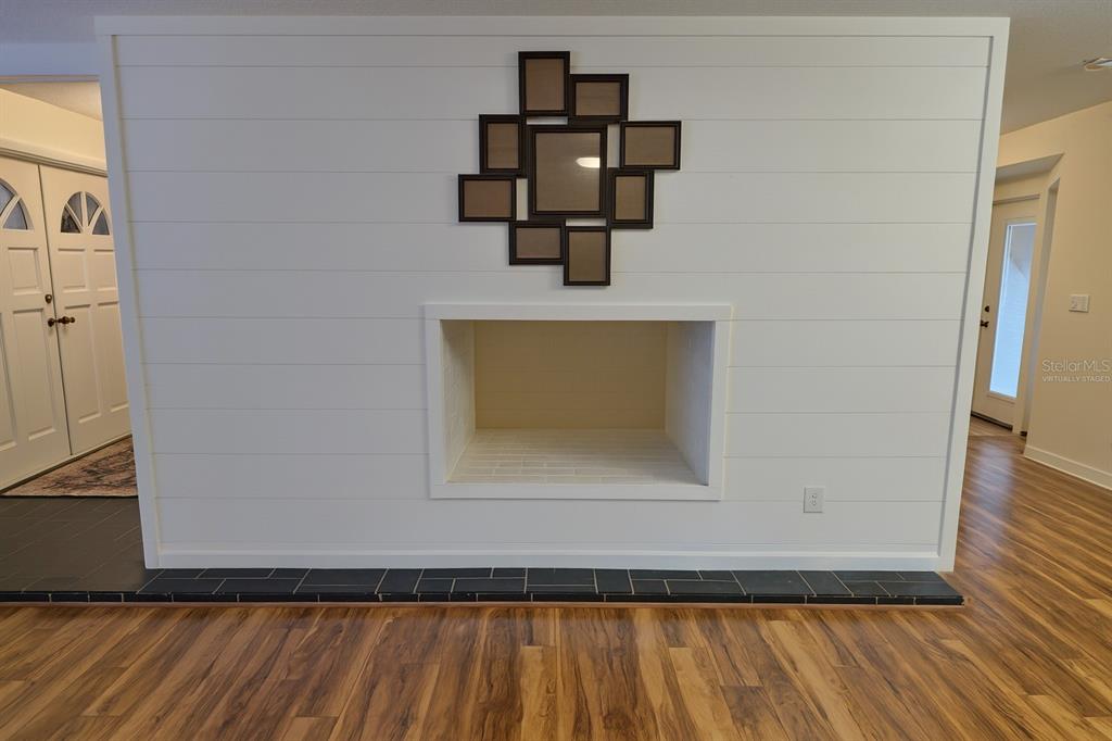 34041 Highland Road Leesburg, FL 34788 - Photo 15 of 33 a bathroom with a sink and mirror