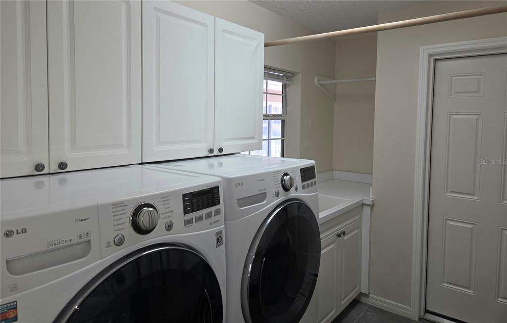34041 Highland Road Leesburg, FL 34788 - Photo 16 of 33 a utility room with dryer and washer