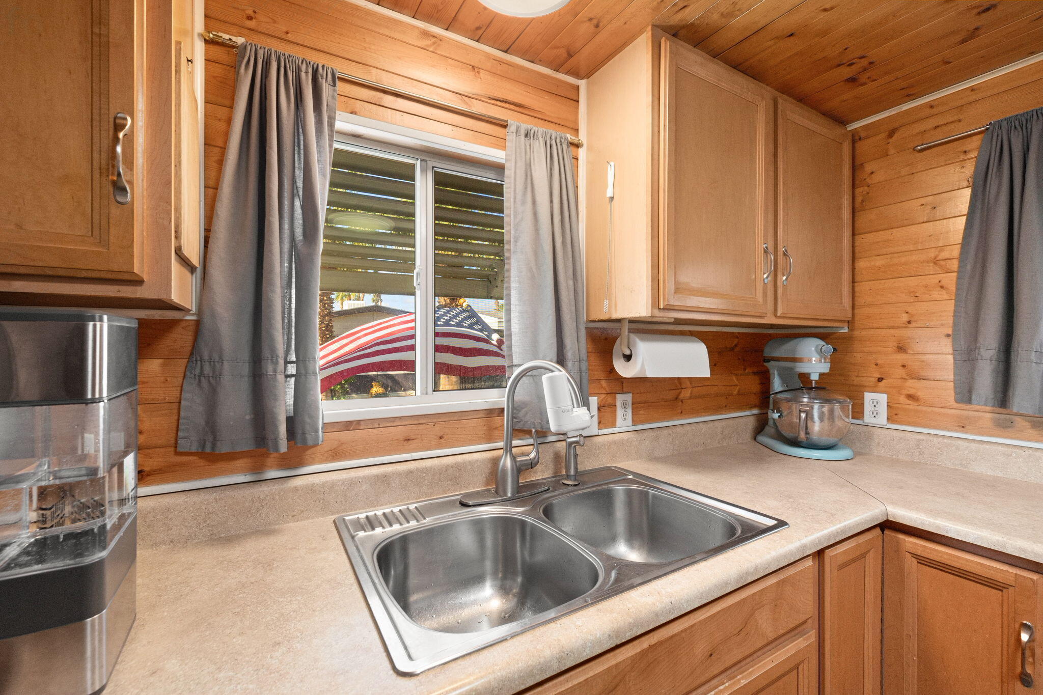 74711 Dillon Road, Unit 318 Desert Hot Springs, CA 92241 - Photo 17 of 53 a kitchen with a sink and a window