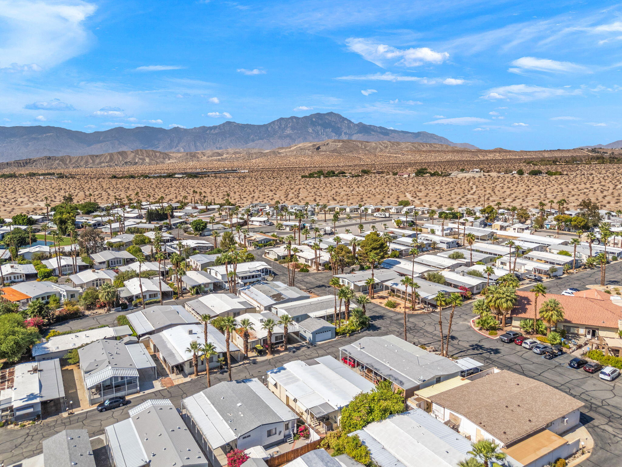 74711 Dillon Road, Unit 318 Desert Hot Springs, CA 92241 - Photo 36 of 53 an aerial view of residential house with outdoor space and mountain view