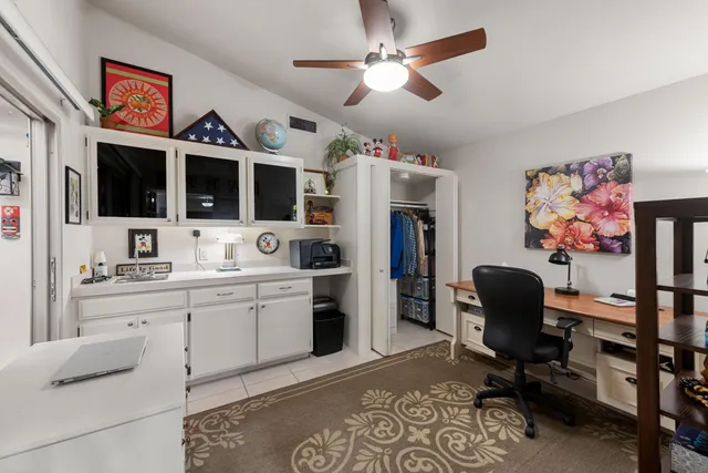 a view of a backyard with sitting area