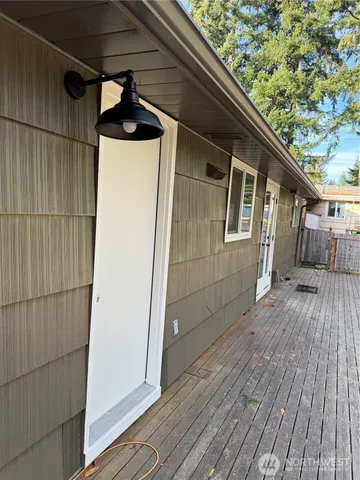 a yard with trees in the background