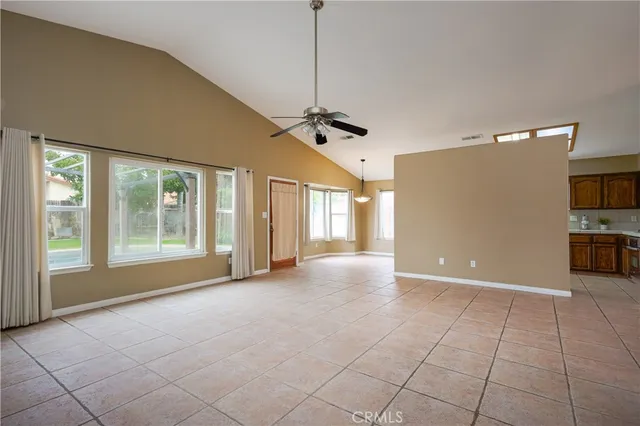 a view of a kitchen with a sink and cabinets