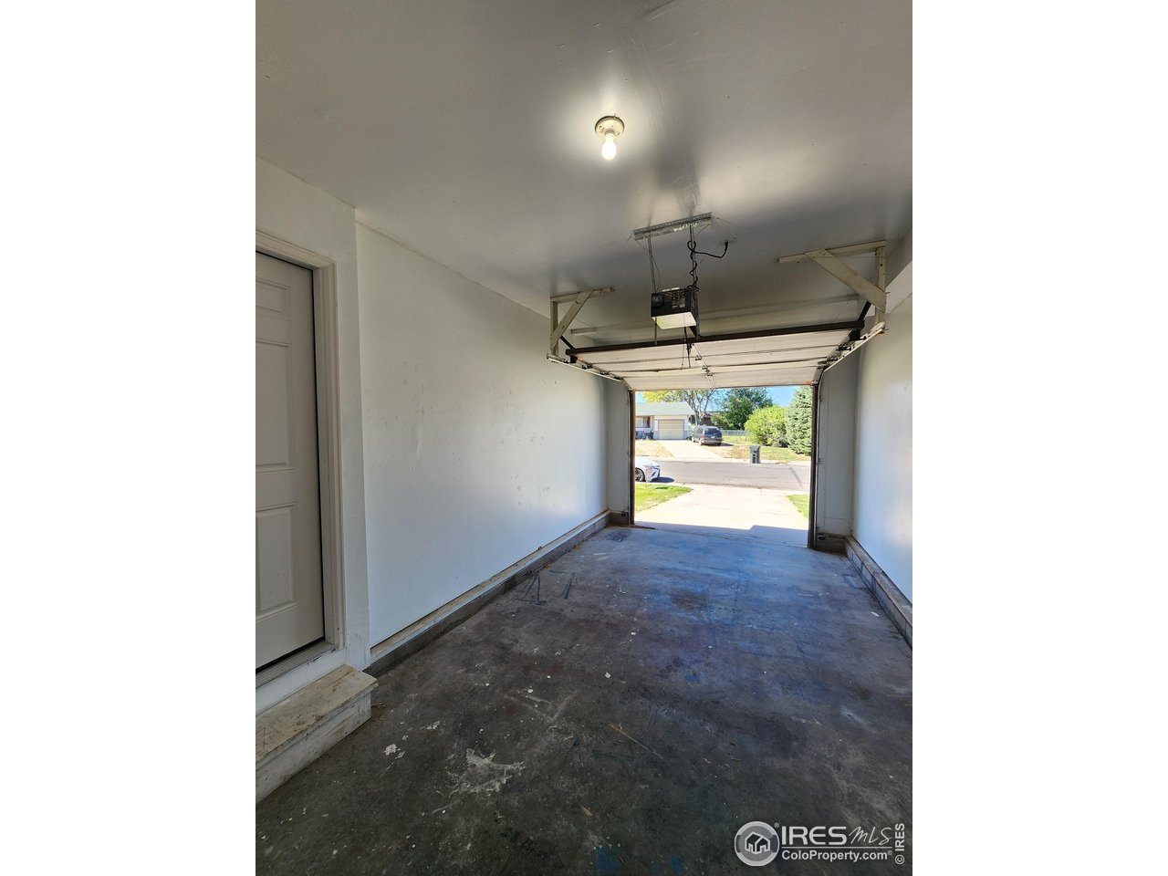 851 Denver Street, Unit 4 Sterling, CO 80751 - Photo 32 of 39 a view of an empty room with a fireplace