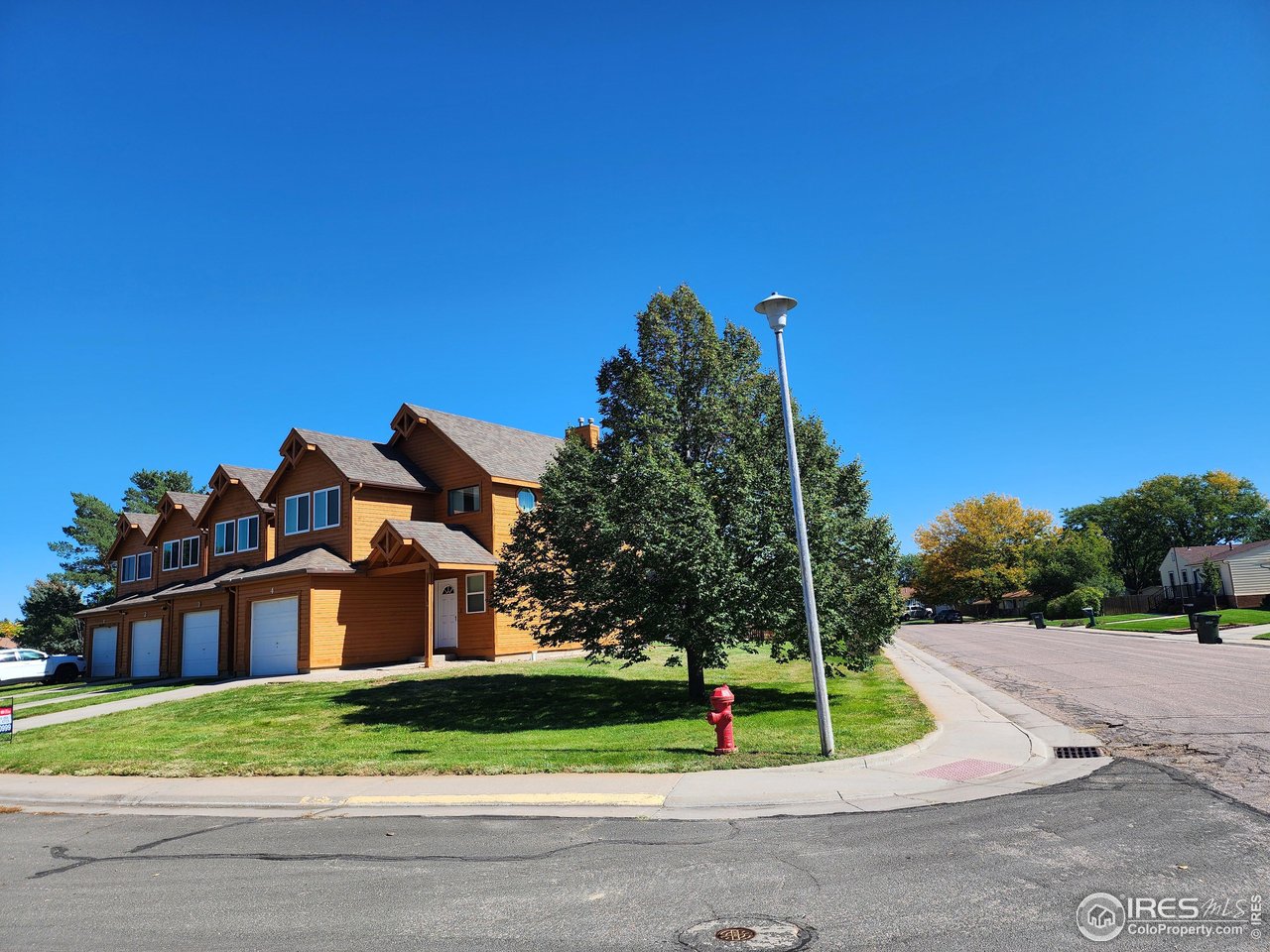 851 Denver Street, Unit 4 Sterling, CO 80751 - Photo 37 of 39 a view of a house with a street